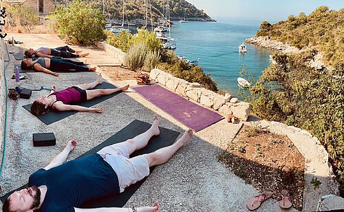 Yoga session in a bay